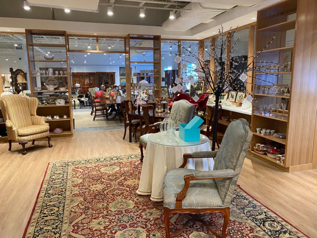 Home furnishings, carpets, chandeliers, jewelry, clothes and more are presented in upscale fashion at the newly renovated Blue Bird Circle Resale Shop. (Photo by Shelby Hodge)