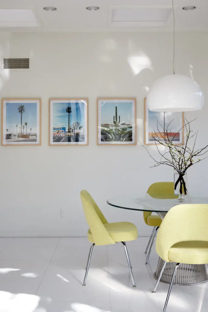 Warren Platner table. Eero Saarinen executive chairs from Knoll. Kartell light pendant from Scott + Cooner. Robert Voit’s New Trees, 2005. (Photo by Pär Bengtsson)