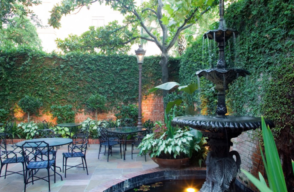 It doesn't get any more romantic than on Brennan's patio where flowers bloom, birds sing, and the fountain gurgles. 
