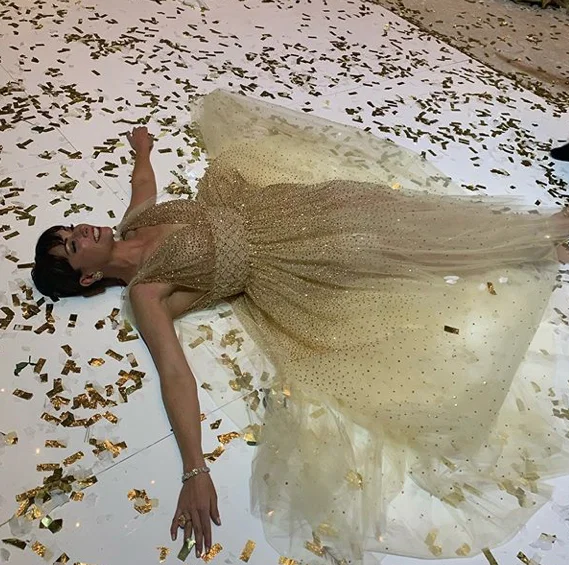 Houston Ballet Ball chair Beth Zdeblick makes a confetti angel on the floor of Wortham Theater Center after the ball. And that's a wrap. (Instagram photo)  