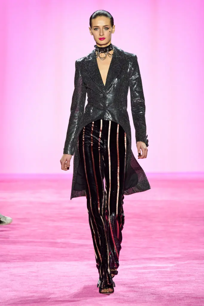 Christian Siriano sequin shimmer single button blazer and striped velvet flare trousers. (Photo courtesy of Imaxtree)