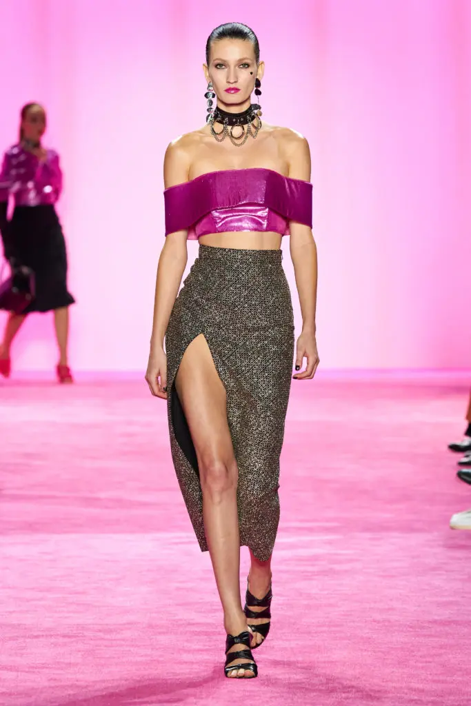 Christian Siriano orchid lacquered velvet off-the-shoulder crop top and "Joker" jacquard high-slit skirt. (Photo courtesy of Imaxtree)