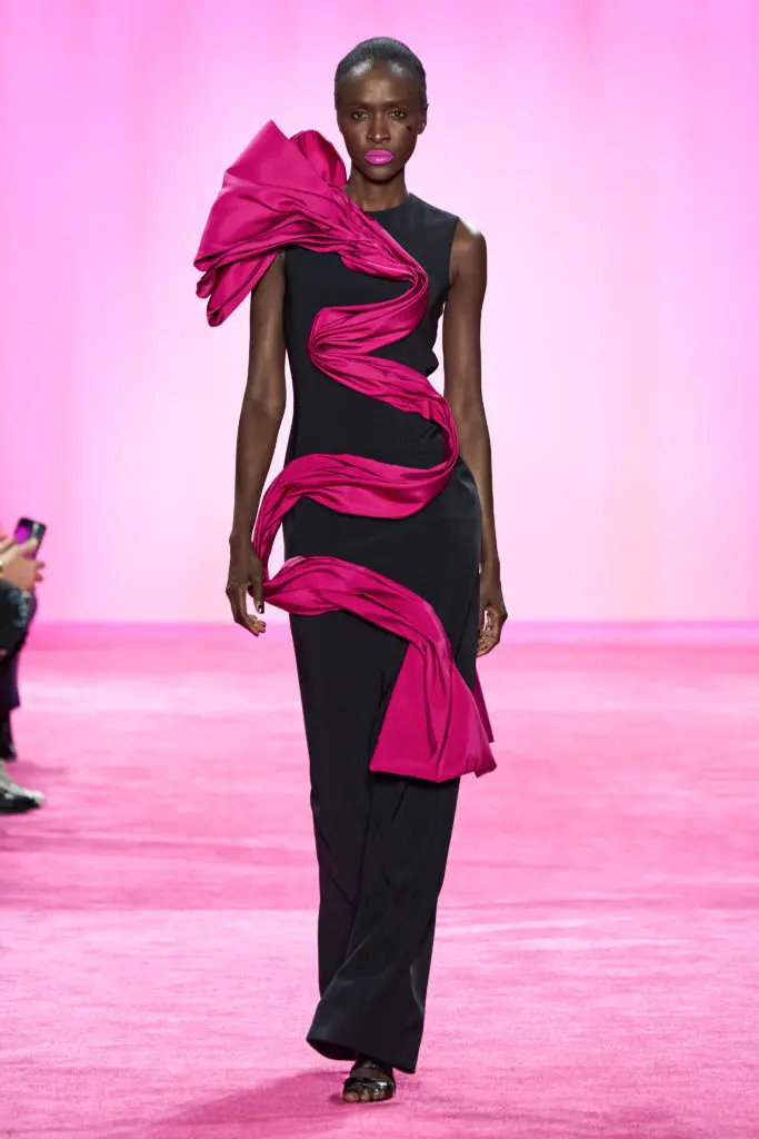 Christian Siriano Gotham black/fuchsia ribbon column gown. (Photo courtesy of Imaxtree)