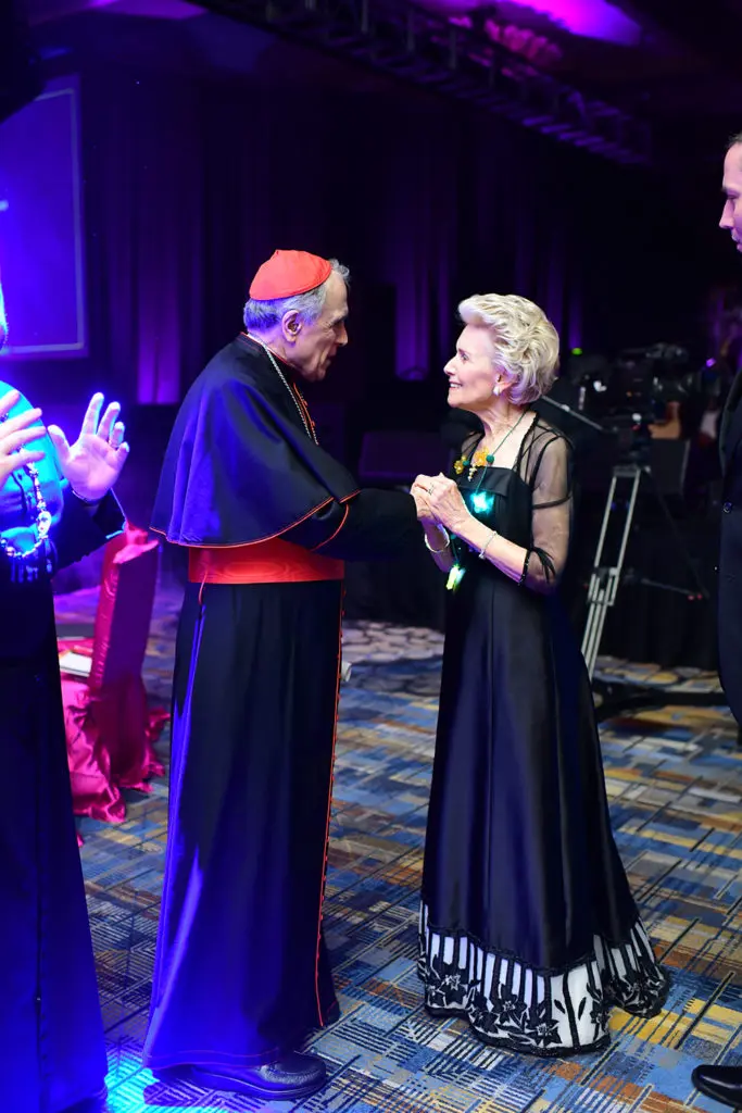 Cardinal Daniel DiNardo, Lois Davis(Photo by Daniel Ortiz)