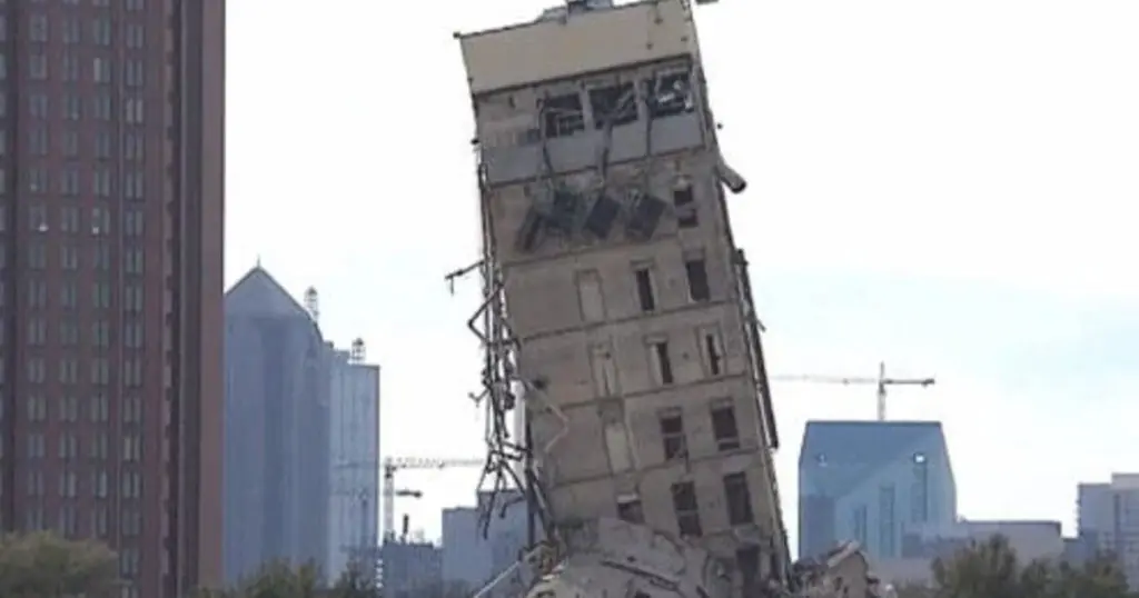 The Leaning Tower of Dallas has become a tourist attraction. But it will fall. Eventually.