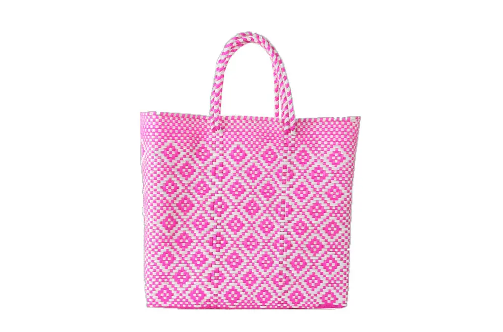 This waterproof, plastic woven bag, made by one of Mi Golondrina’s artisan community partners, is quite possibly the best beach tote in the game. It might even be the best tote in the game. We’ll stand by it.