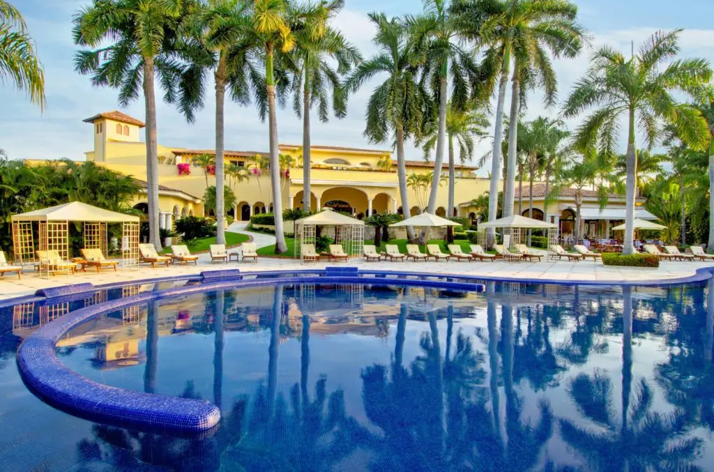 The quaint property of the hotel is surrounded by botanical gardens and the Marina Vallarta Golf Course. 