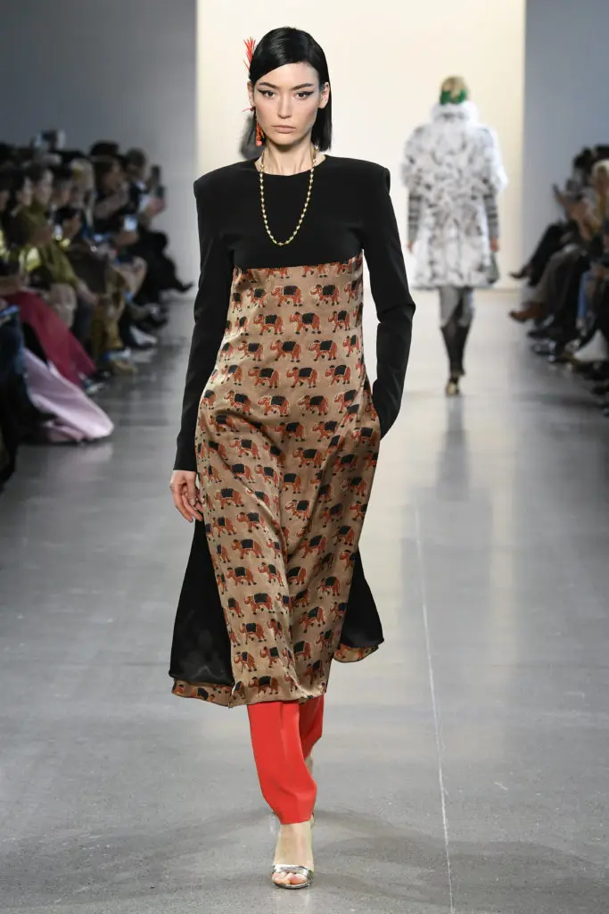 Bibhu Mohapatra rust organic silk block print Angarakhi tunic with red crepe cigarette pants. (Photo by Yannis Vlamos/Indigital.tv)