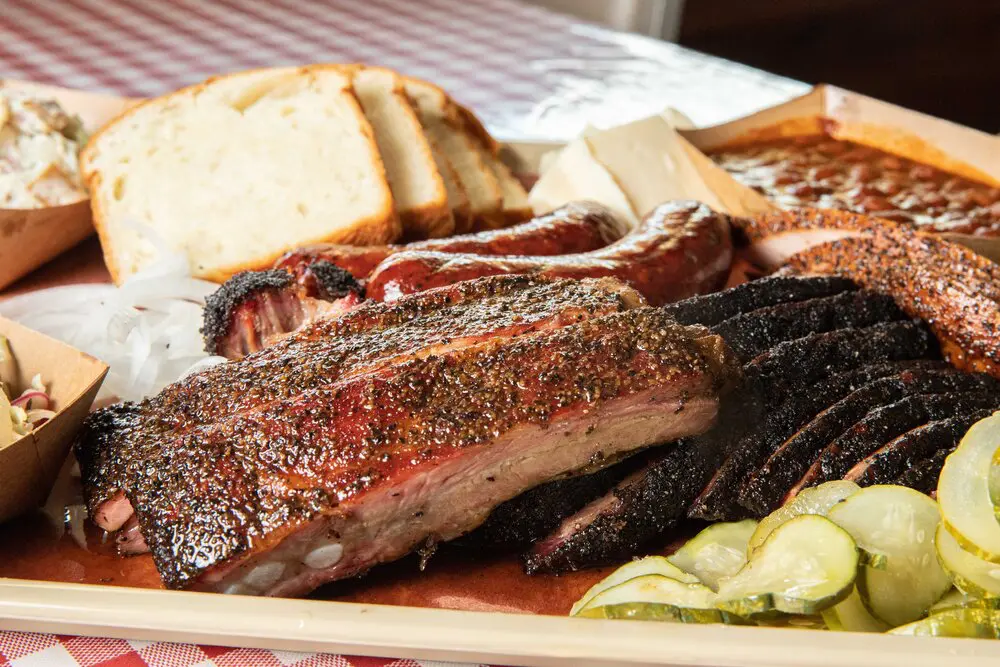 Goldee’s tray brimming with barbecue