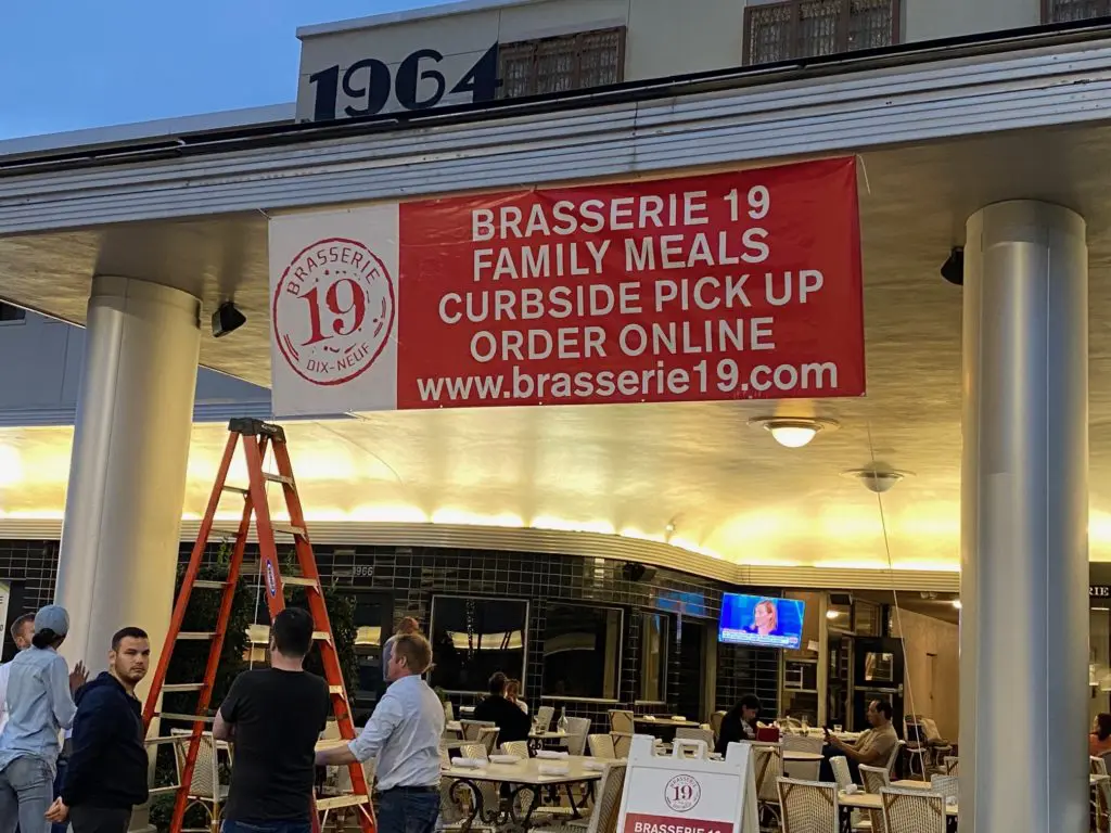 The new normal as Brasserie 19 in River Oaks Shopping Center promotes its curbside service. (Photo by Shelby Hodge)
