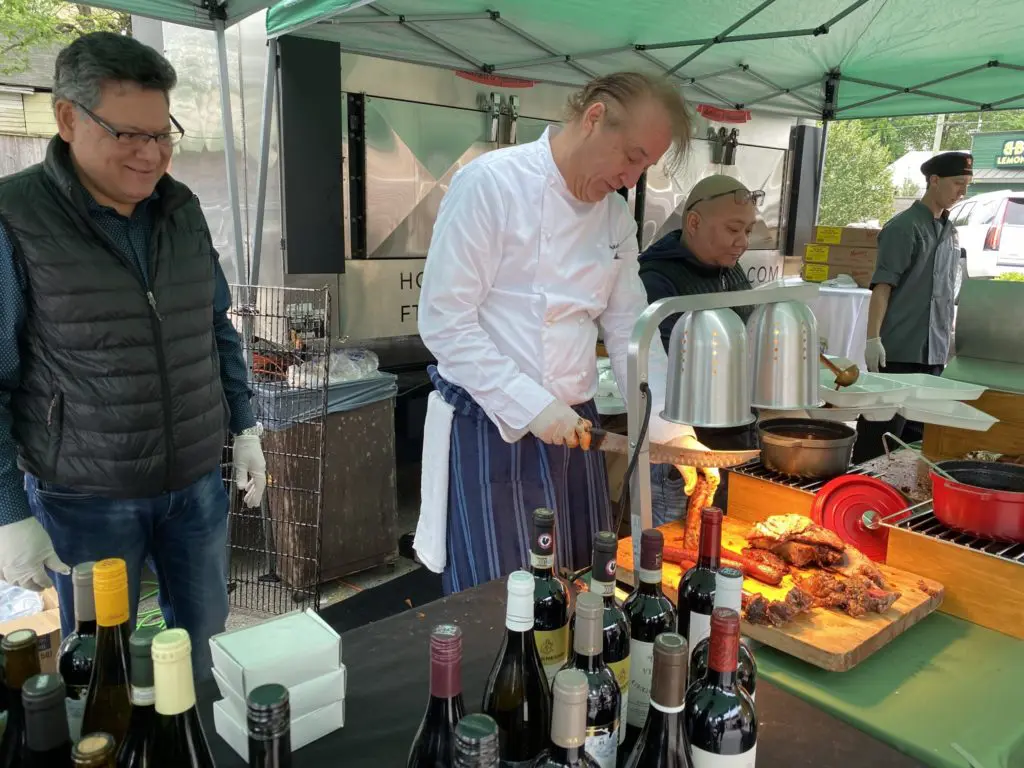Turner's GM Jose Montufar and Chef Robert del Grande of Turner's and The Annie on the scene at the Berg Hospitality Drive-Thru barbecue fundraiser for employees, which repeats on Sunday. (Photo by Shelby Hodge)