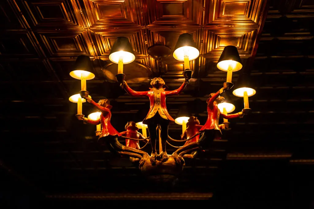 The monkey chandelier in the cozy bar (Photo by Kirsten Gilliam) 