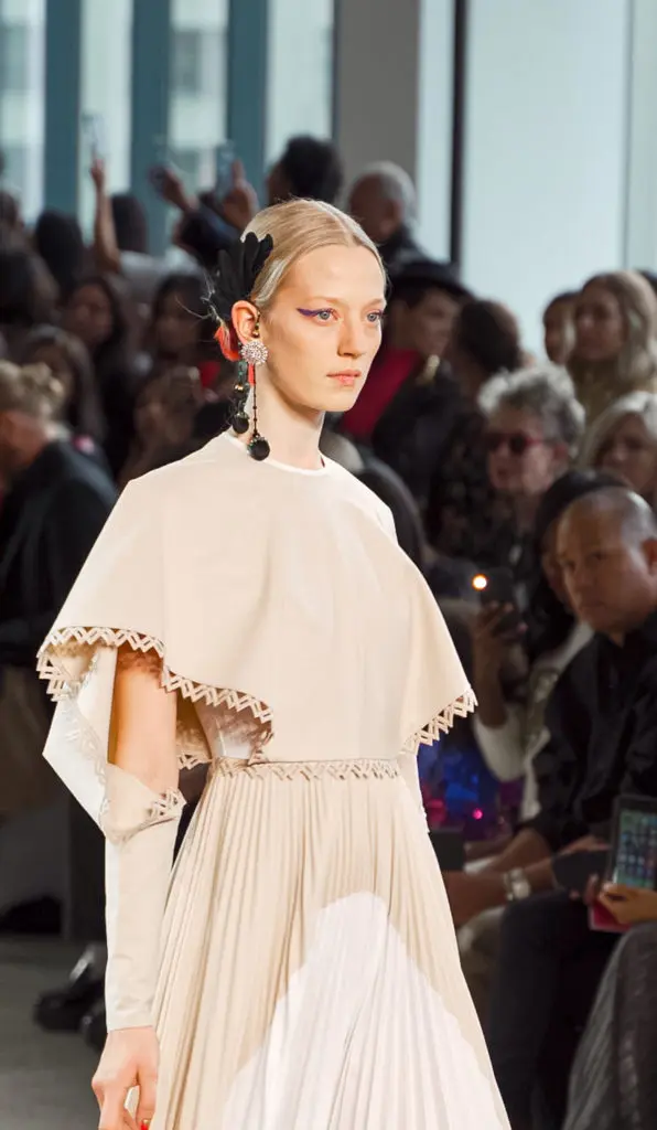 Bibhu Mohapatra sand and ivory Jaisalmer safari dress with earrings from the Narayan Jewelers Empress Collection. (Photo by Anna Vivare)