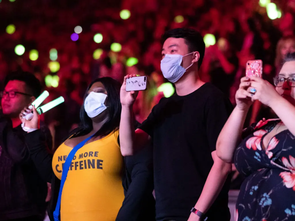 Some NCT 127 fans wore surgical masks in the last concert before the Houston Rodeo was canceled . (Photo by F. Carter Smith)