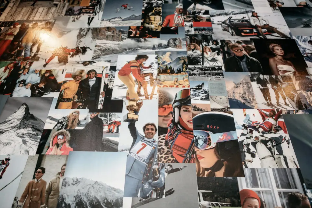 The walls are absolutely covered in cool vintage or editorial portraits evoking alpine culture. 