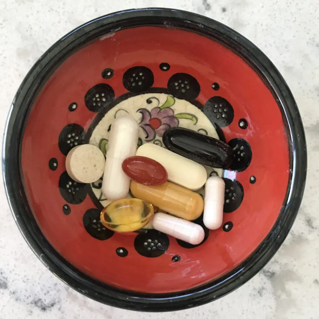 Tiny Turkish bowl, a gift from a vendor in the Grand Bazaar, serves as a perfect holder for daily vitamins. 