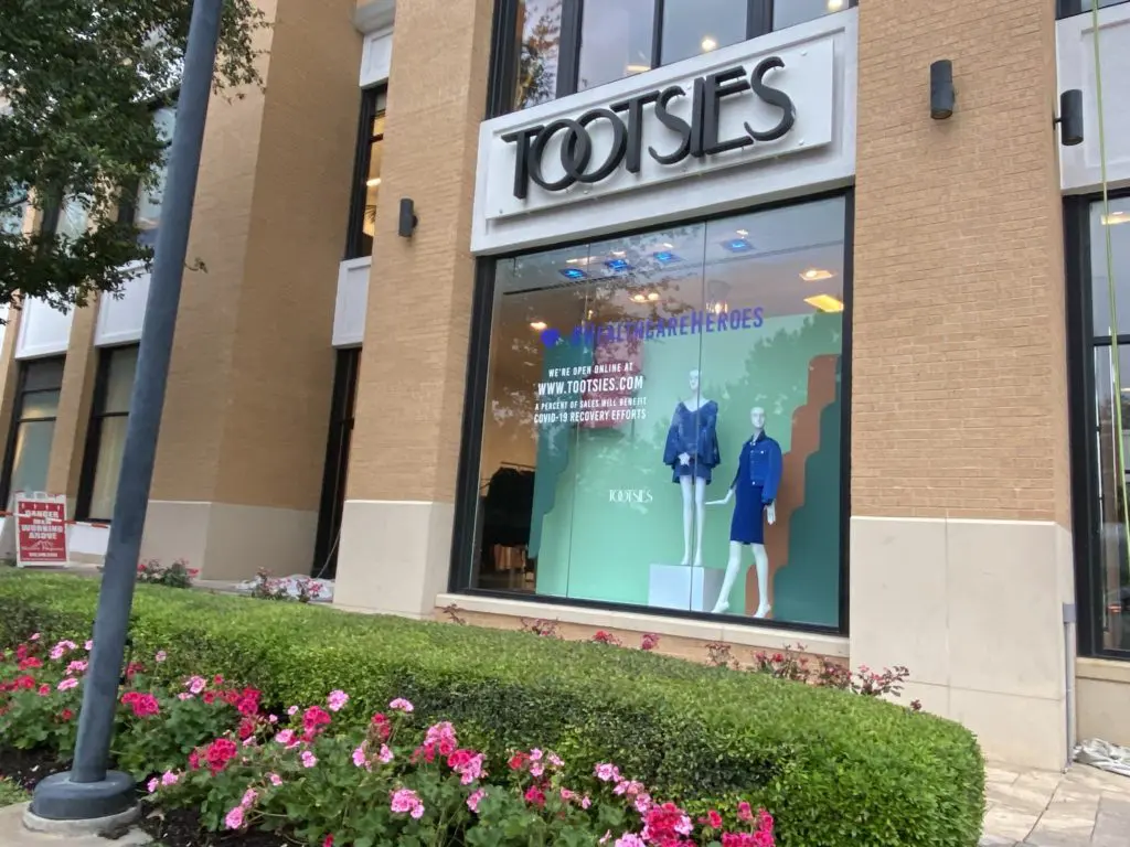 Tootsies salutes frontline health care workers in its display windows and contributes to non-profits.