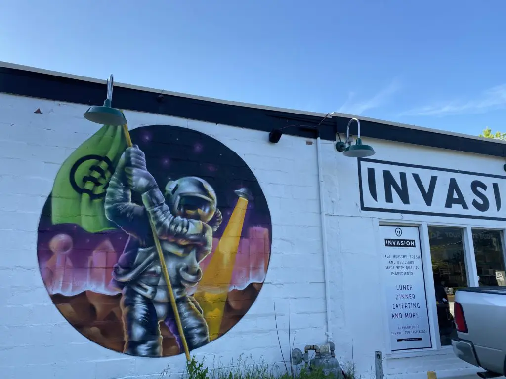 Lots of cool murals decorate the new spot. (Courtesy of Invasion)