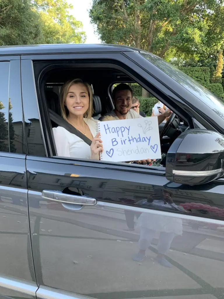 Reagan Howard and here fiancé Alex Bregman drive in with birthday greetings for Sheridan Williams.