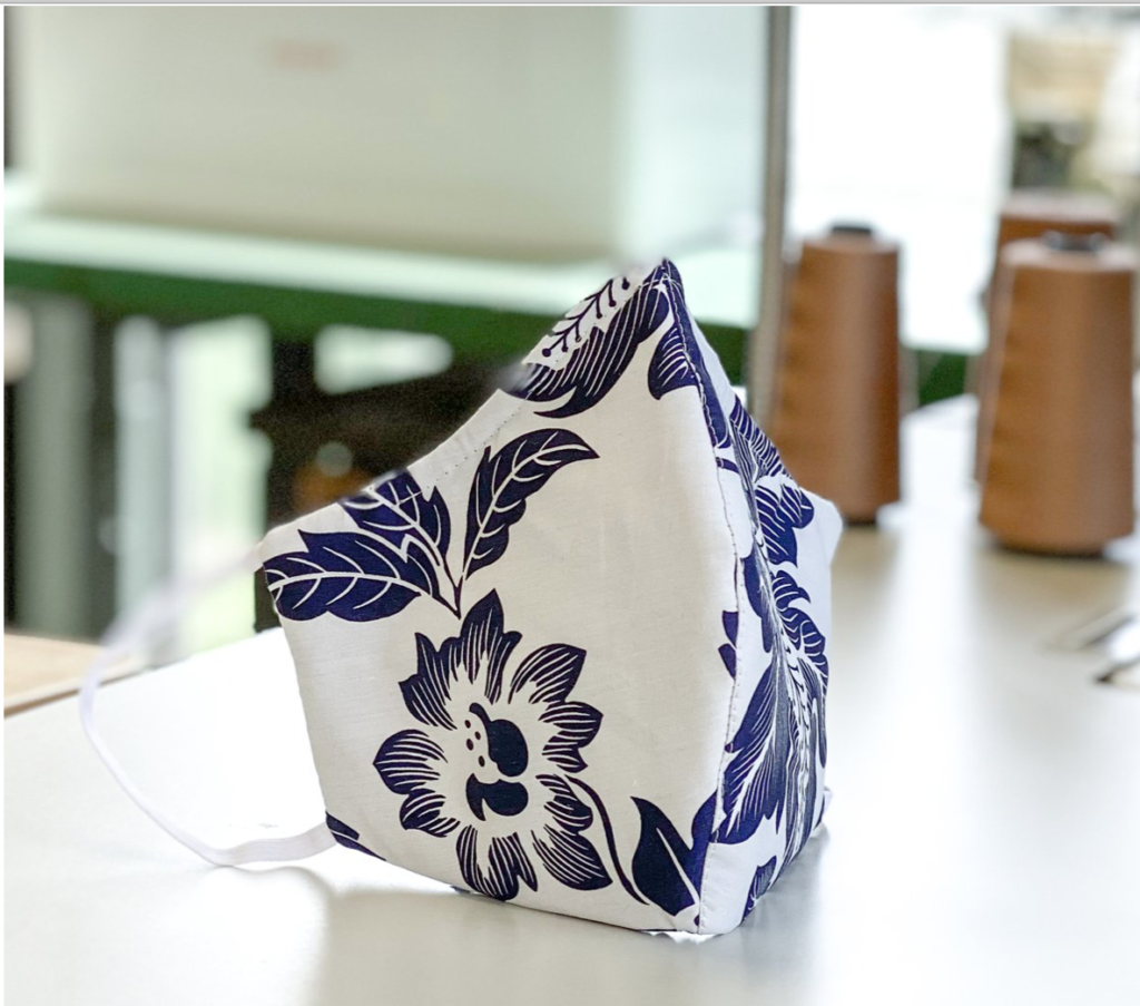 David Peck's non-woven polypropylene is covered in fun fabrics adding a fashion note to the pandemic face masks.