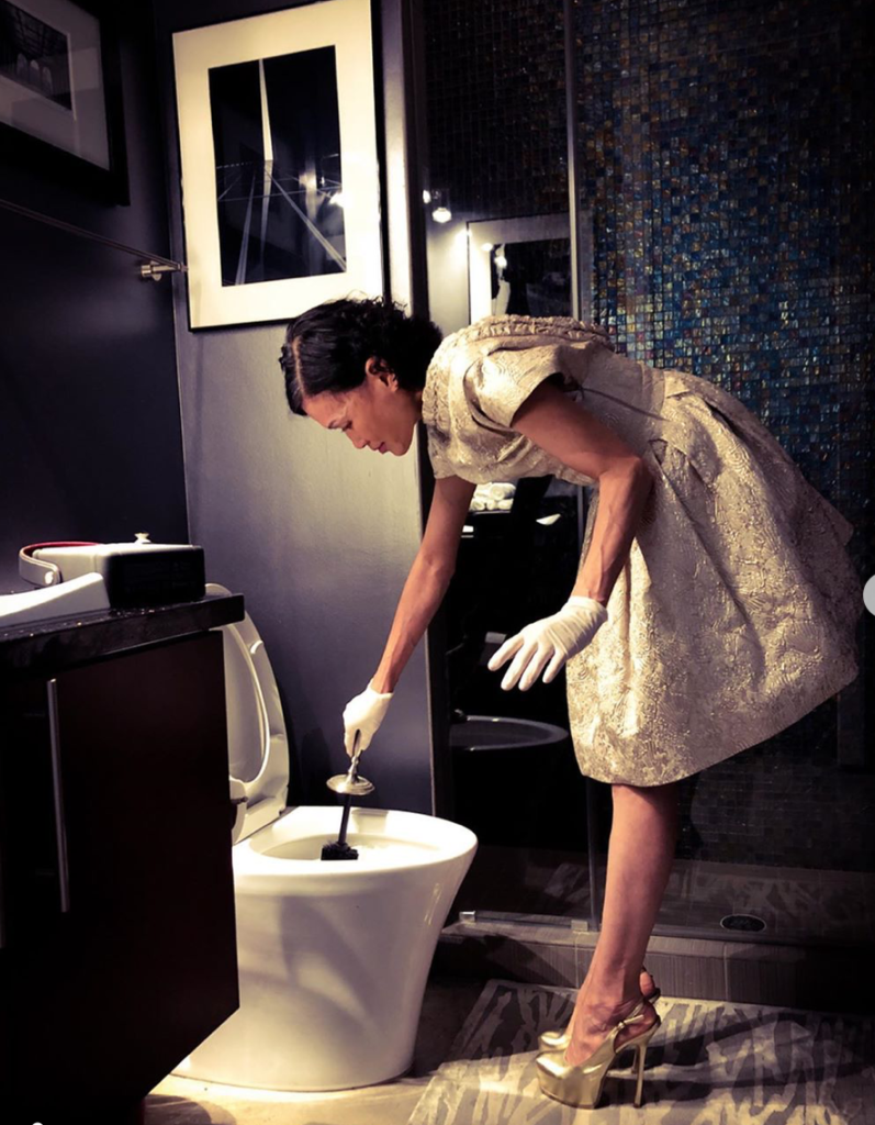The ever-fashionable Duyen Nguyen dressed up for toilet cleaning in a spoof on social isolation — an Instagram hit. 
