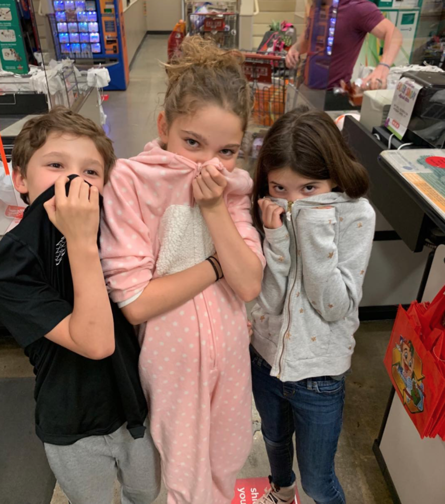 Jason and Courtney Hill Fertitta's children make shopping in Brenham safe. (Courtesy photo)  (Photo by F. Carter Smith)