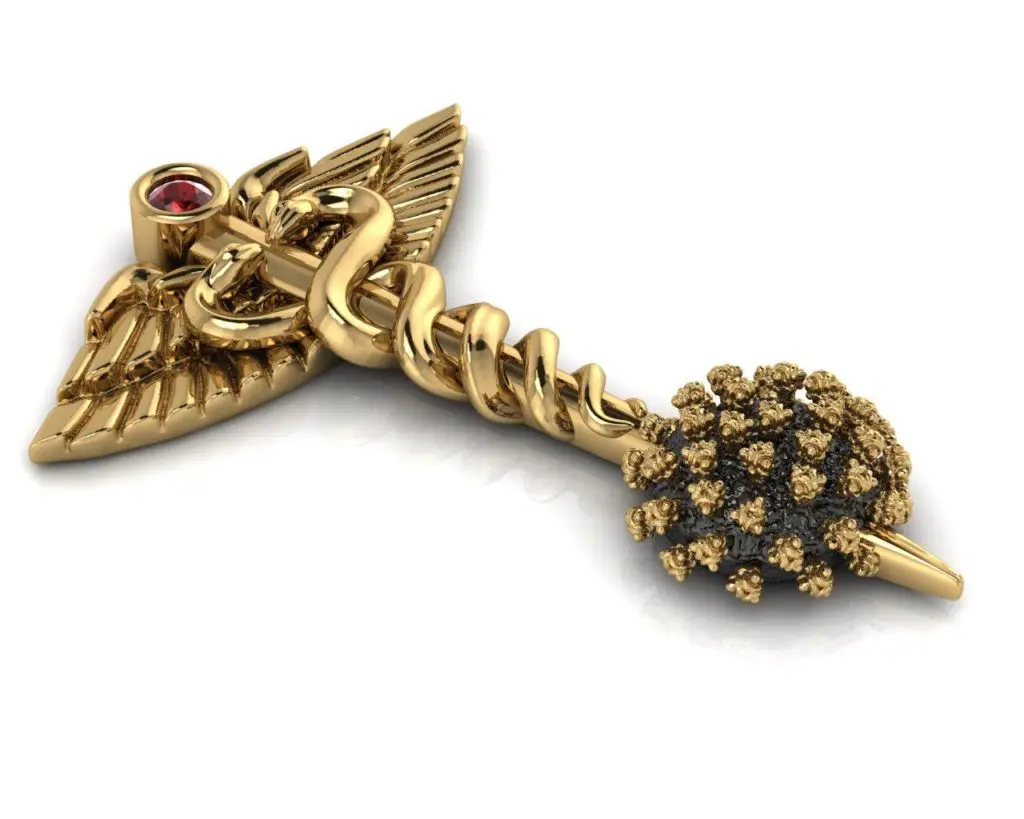 The 'Defeating the Virus' pin created by Franco Valobra of Valobra Master Jewelers in Houston and New Orleans salutes health care workers in the COVID-19 battle..
