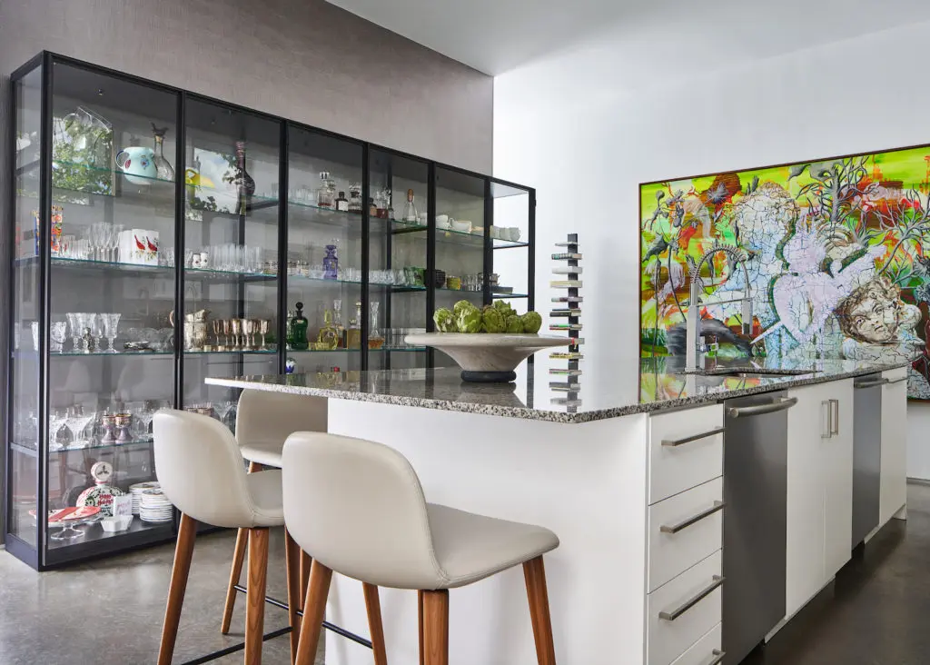 Kitchen cabinet from Smink holds Kleinmann’s glass
collection. Design within Reach stools. Kristina Girke painting, Galerie Christian Schindler, Darmstadt, Germany. (Photo by Stephen Karlisch)