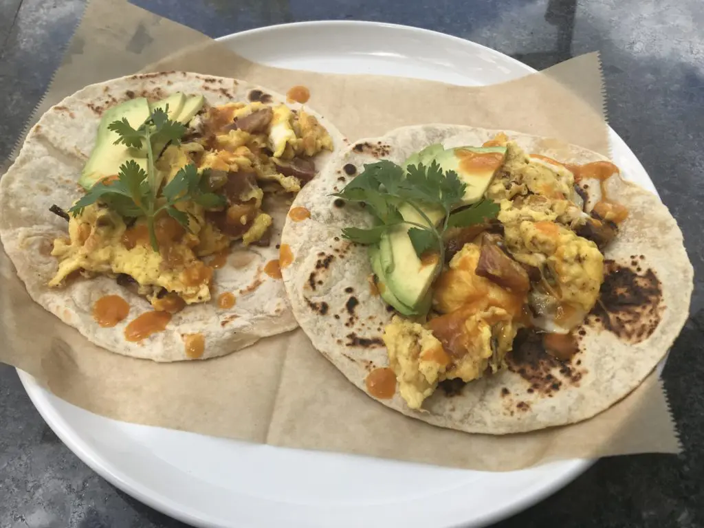 Breakfast tacos by Chef Beto Gutierrez lead the Fly By Taco Company menu at The Tasting Room in Uptown Park. The daily curbside service begins on Tuesday.