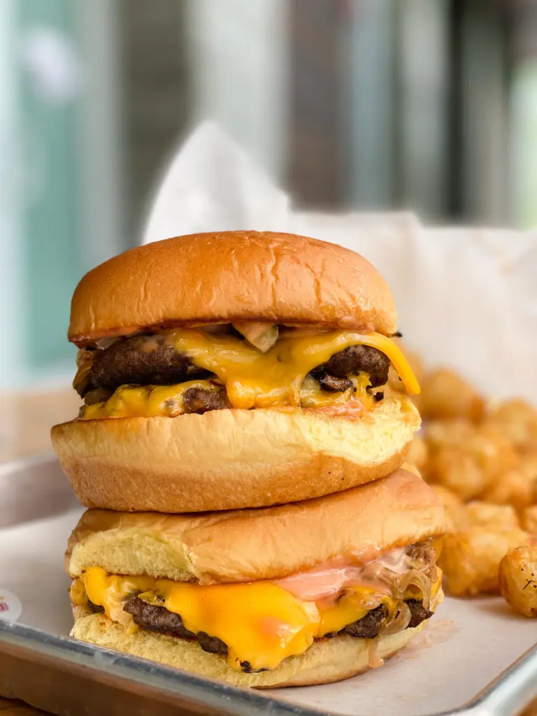 The Daddy's Double and Single stacked up for a photo at Daddy's Burgers.(Clark Cooper Concepts Photo)