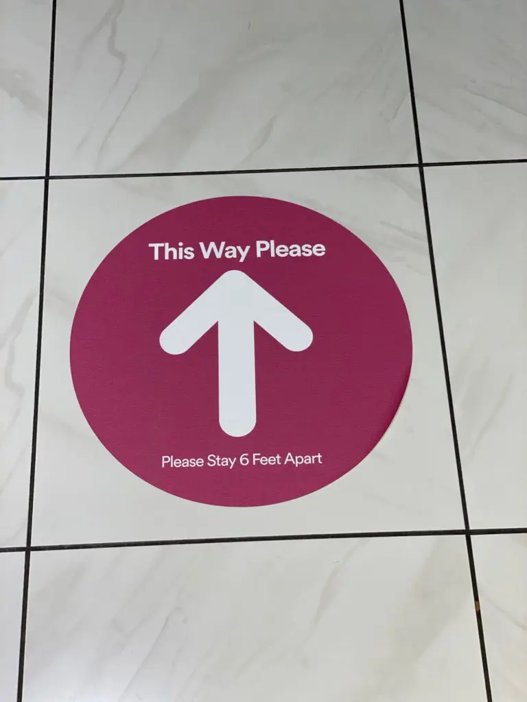 Signs throughout The Galleria direct foot traffic in one-way patterns in order to maintain social distancing. (Photo by Shelby Hodge)