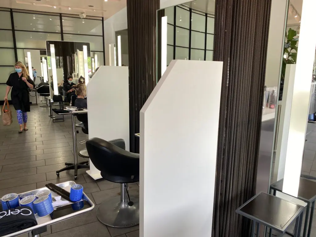 Ceron Hair Salon with its new barriers, installed in adherence to the coronavirus protocols. (Photo by Shelby Hodge)