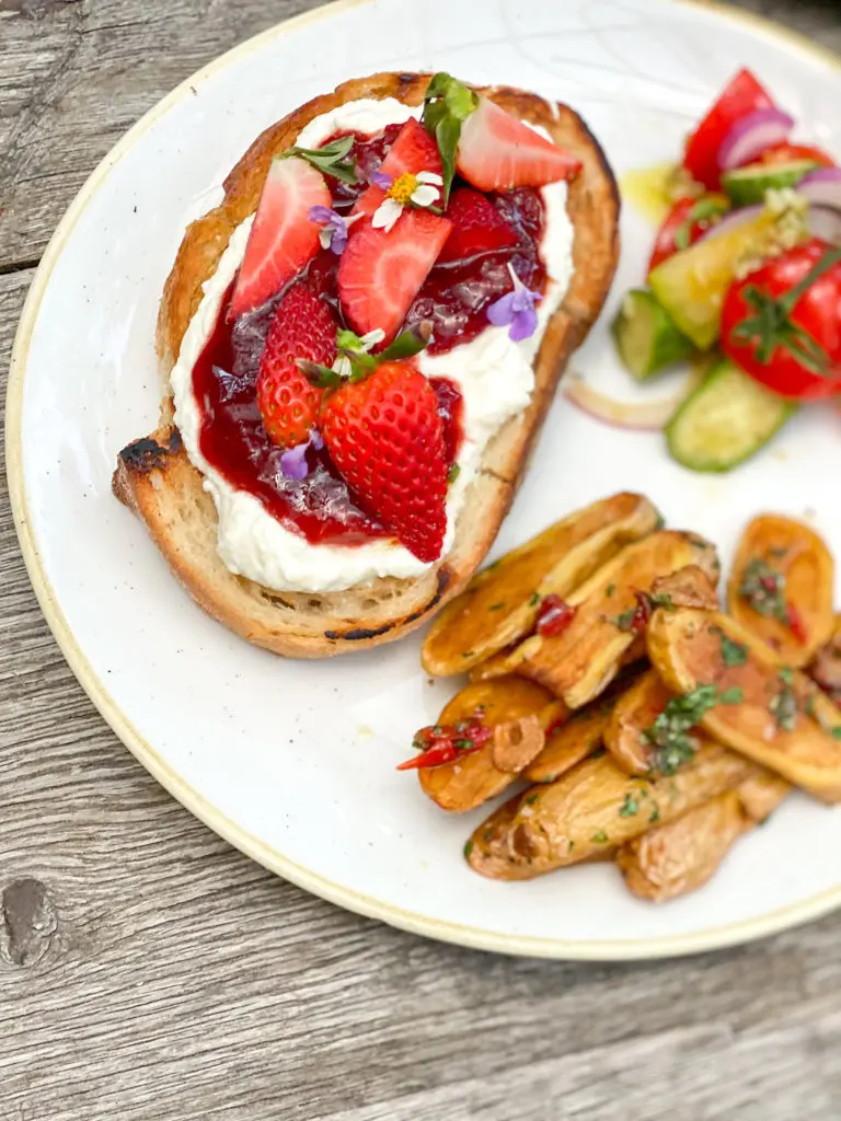 The Strawberry Rhubarb Ricotta Tartine from The Dunlavy makes a sweet treat for Mother's Day.
