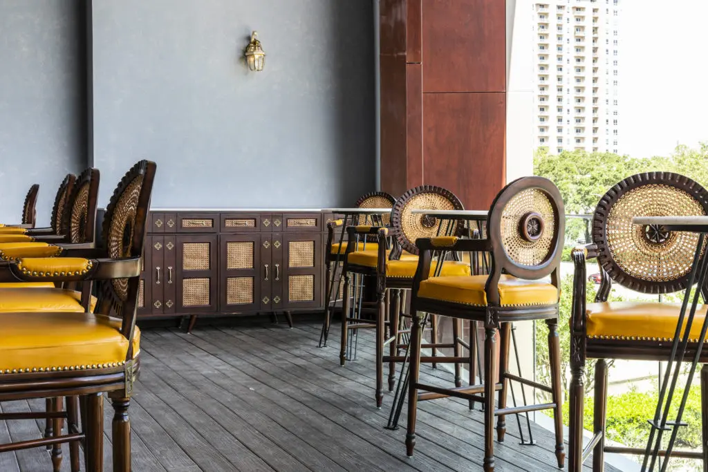 Seating in the outdoor lounge looks across the parking area to bustling Westheimer. (Photo by Julie Soefer)