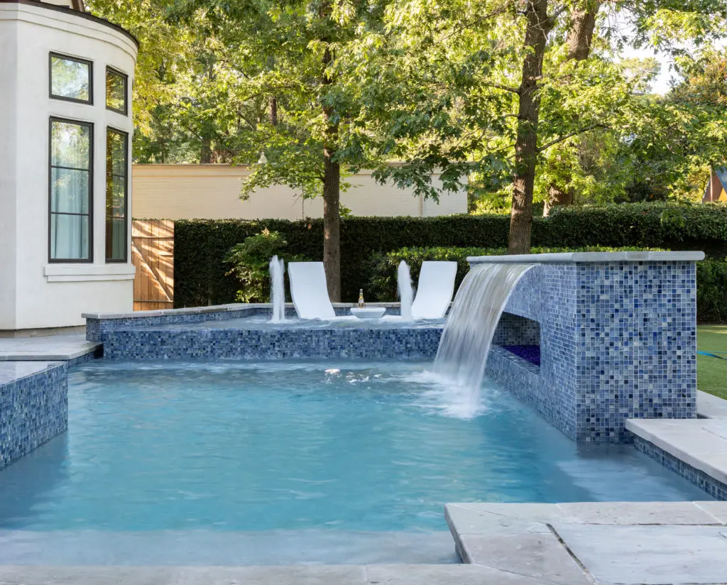 A beautifully-designed swimming pool can transport the homeowner into a world of his own. (Photo courtesy of Frankel Building Group)
