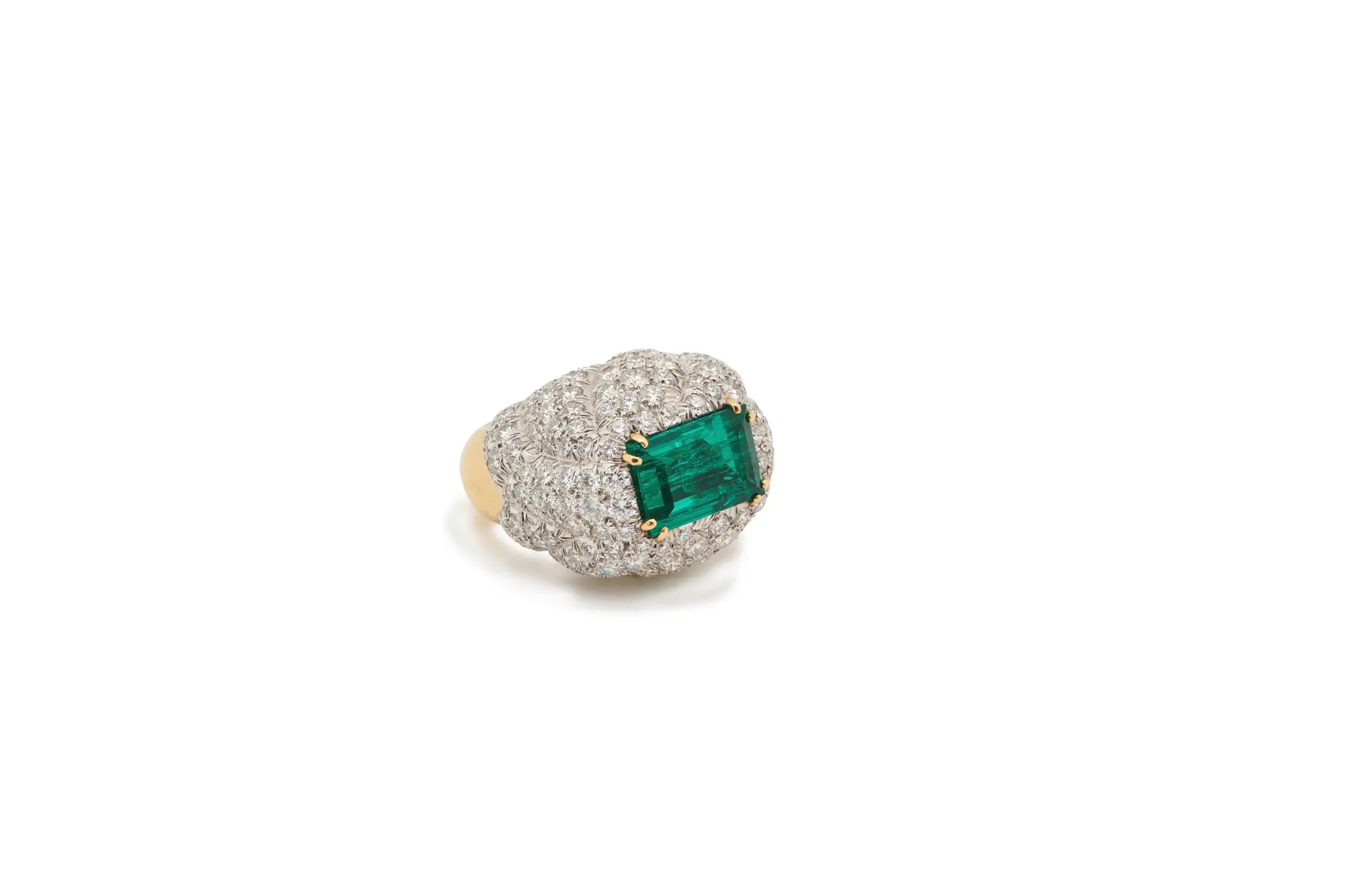 Diamond encrusted ring with vibrant emerald.