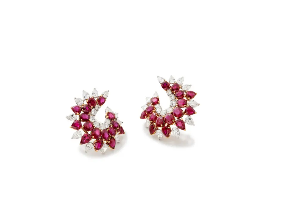 Firey ruby and diamond cluster earrings.