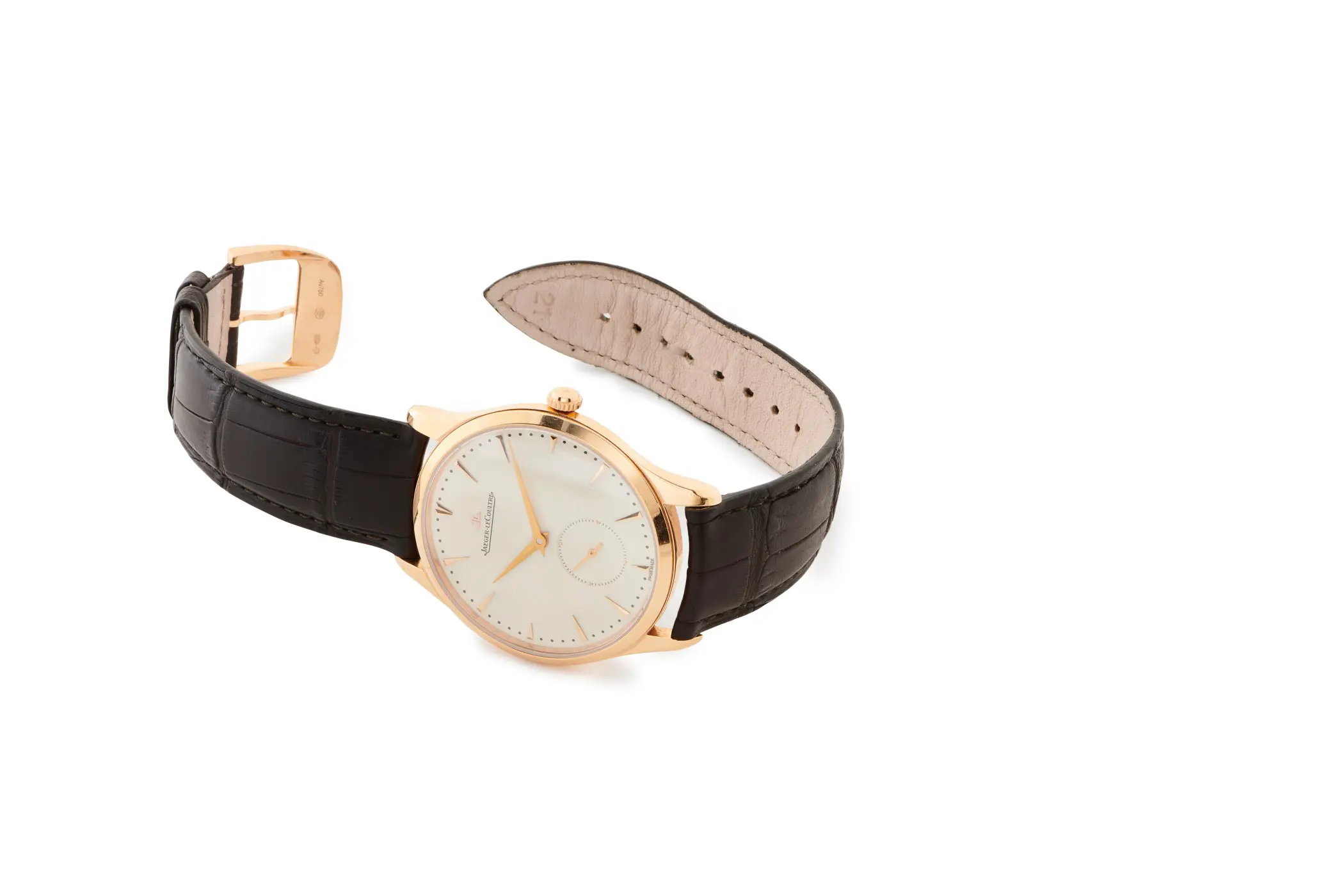 Gold Jaeger LeCoultre with leather band.