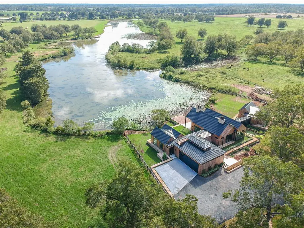 The first home in the Orchards at Pecan Acres overlooks Lake Lucille. (Photo by ProHouston)