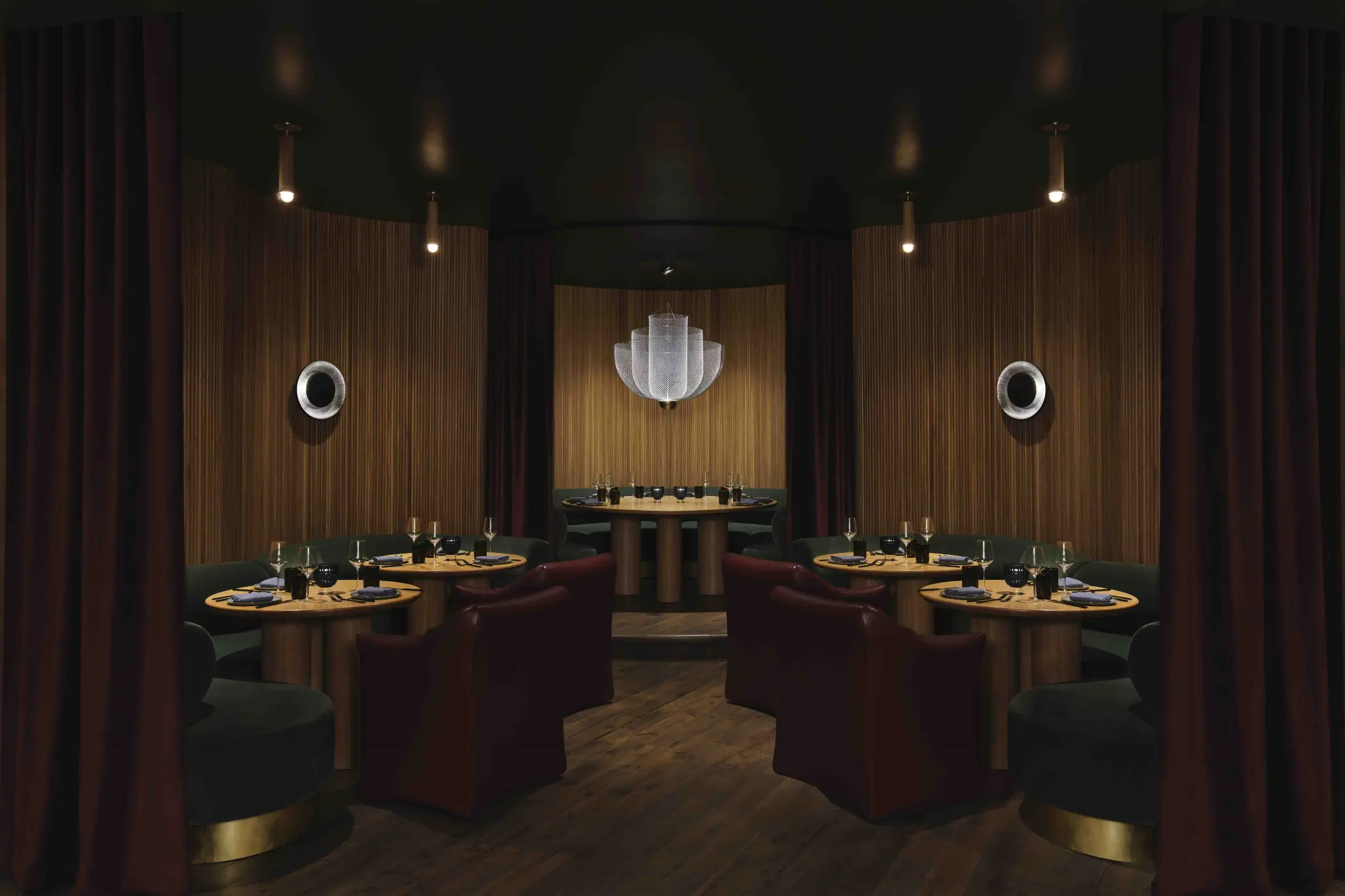 The Shag Room’s circular design — a mainstay of every Virgin Hotel property — presented aesthetic challenges for Mozersky that he solved with a serpentine ruched banquette. The Meshmatics chandelier designed by Rick Tegelaar for Moooi is through Scott + Cooner.