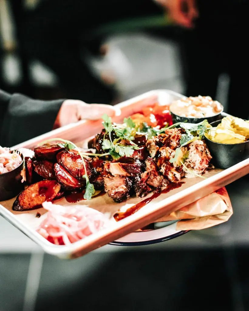 The BBQ Plate at JAXON comes with brisket, pulled pork, and sausage. (Courtesy)