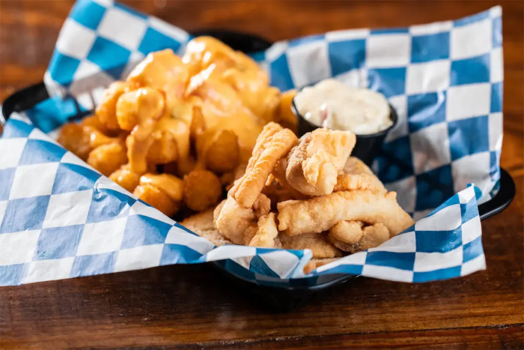 The Pimento Cheese Queso Smothered Tots at Palmer's are a must-try. (Photo by Kathy Tran)