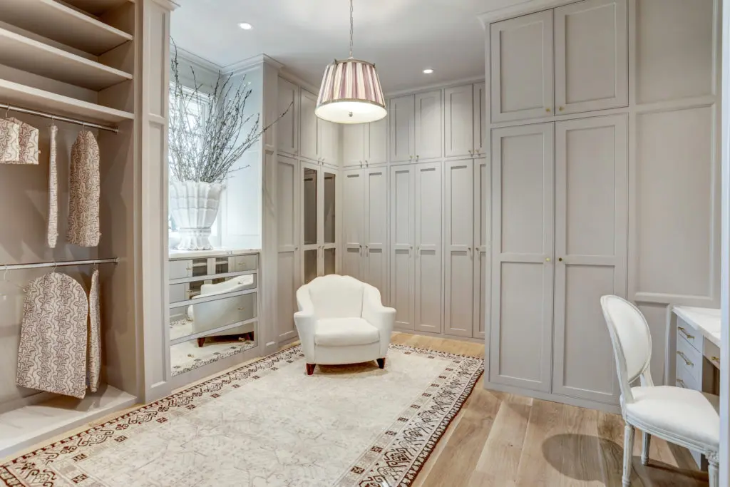 Her closet in the master suite includes a makeup vanity and velvet-lined drawers.
