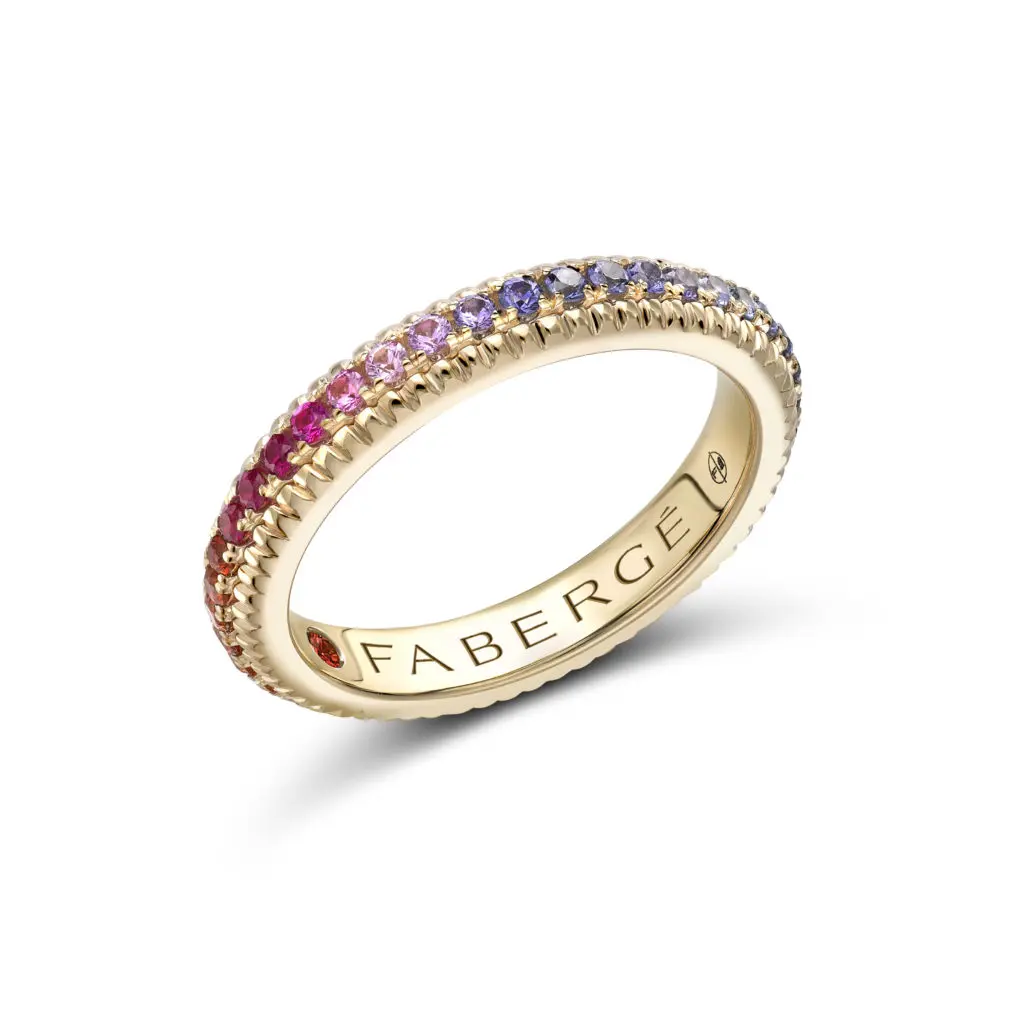 The yellow gold rainbow Sapphire, Tsavorite & Diamond set fluted band ring.