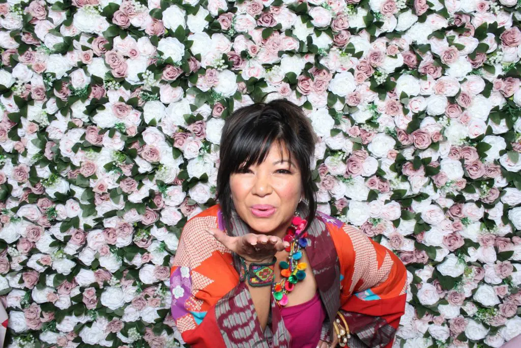 Tina Zulu of Kimono Zulu styling a colorful long-sleeve kimono