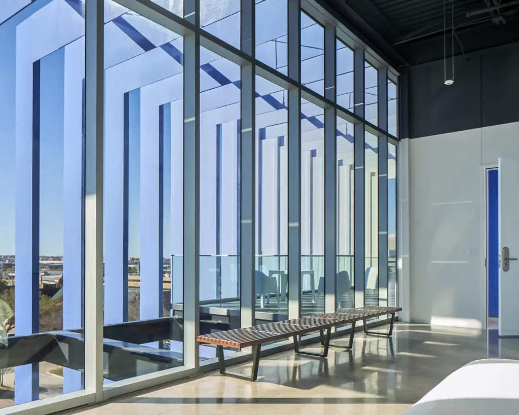A guestroom with a view to the Sky Deck Lounge.