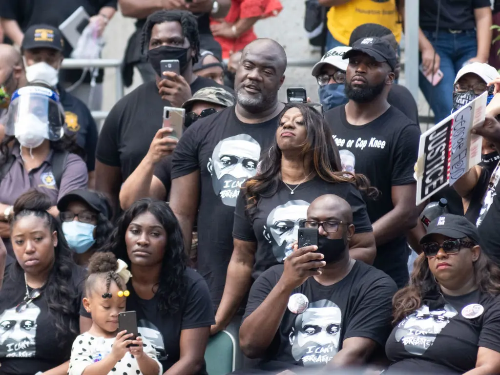 Sixteen members of the George Floyd family from Houston listened to remarks by an attorney retained by the family after the Houston March For George Floyd ended up at Houston City Hall. (Photo by F. Carter Smith)
