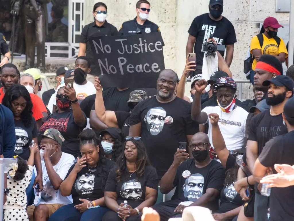 Sixteen members of the George Floyd family from Houston listened to remarked after the Houston March For George Floyd ended up at Houston City Hall. (Photo by F. Carter Smith)
