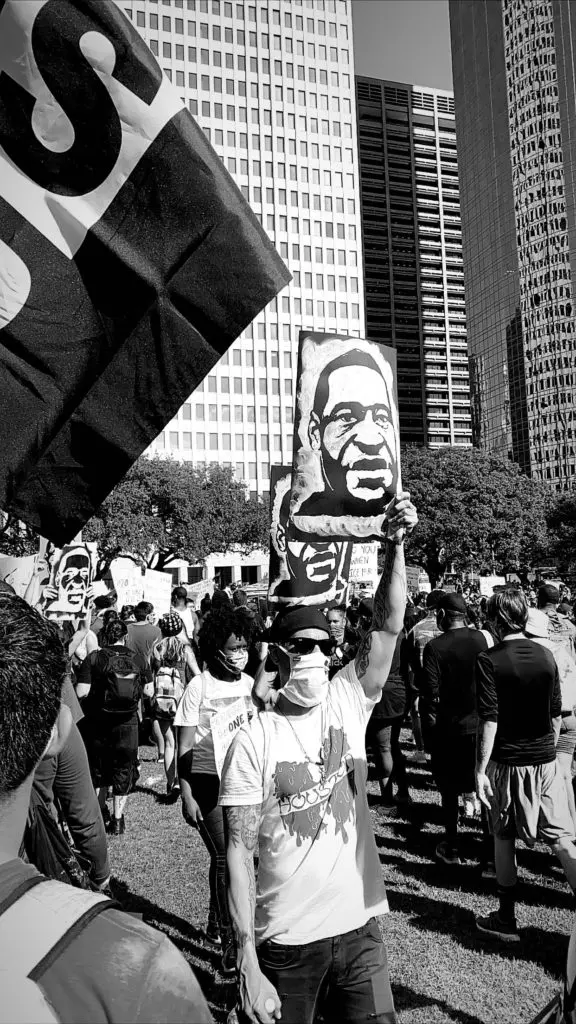 The Houston marchers held up signs and shouted out chants. (Photo by Kara Smith)