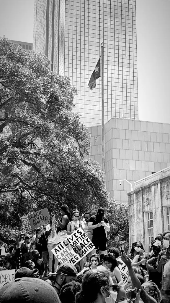 The George Floyd march in Houston brought plenty of powerful images and statements. (Photo by Kara Smith)